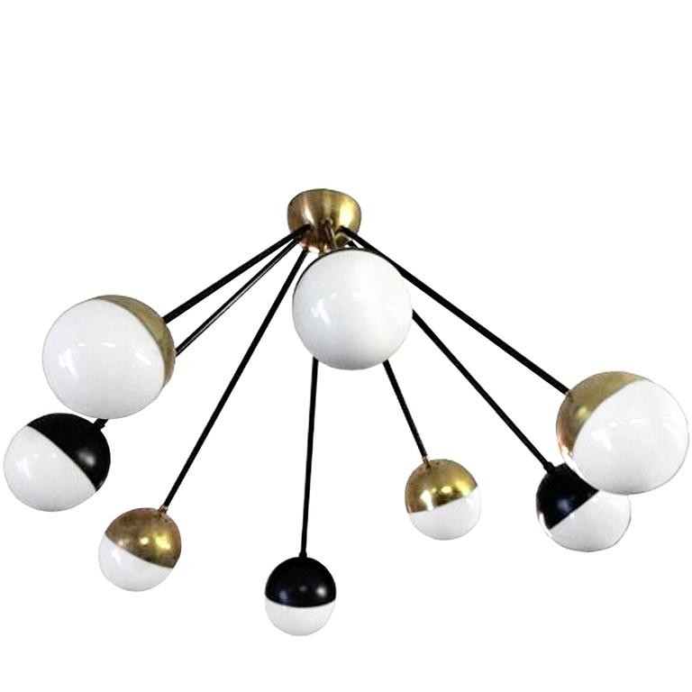 Eight Brass and Black Arm Chandelier with Glass Globes by Stilnovo